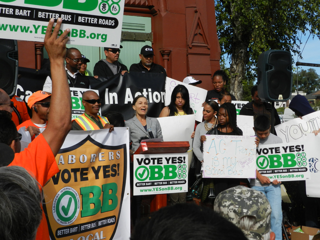Sandra Hamlat of the League of Conservation Voters of the East Bay with union members and Street Academy students.